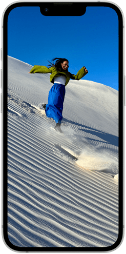 Fiori colorati sul display Super Retina XDR di iPhone 16e